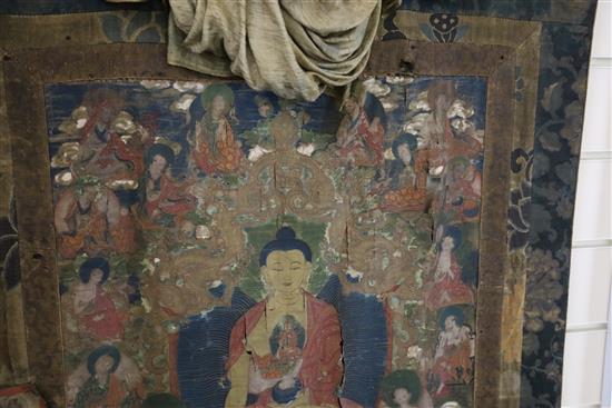 A thangka depicting Buddha Shakyamuni, Tibet, 18th/19th century, Total dimensions 123cm x 75cm, tears